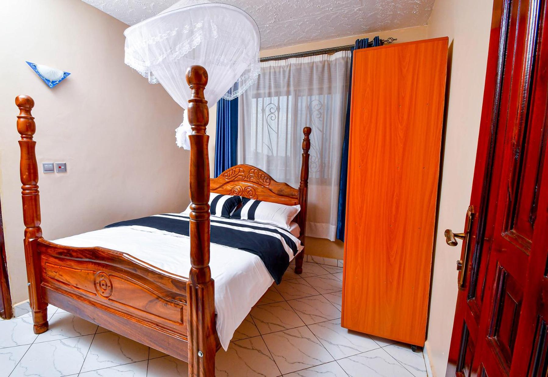 Peace Of Mind Suites เอนเทบเบ้ ภายนอก รูปภาพ